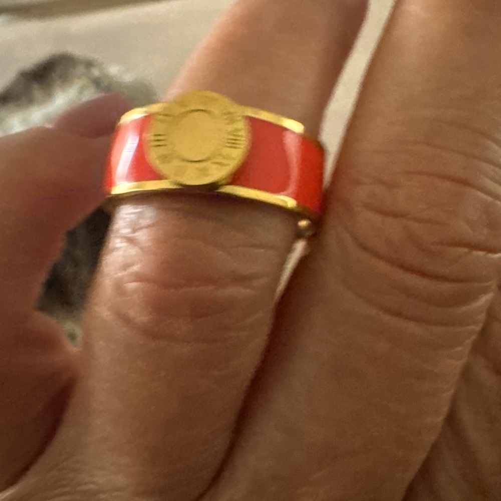Brings orange and gold ring